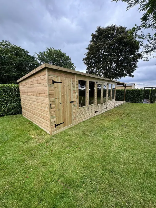 Extra-long garden building with glazed front