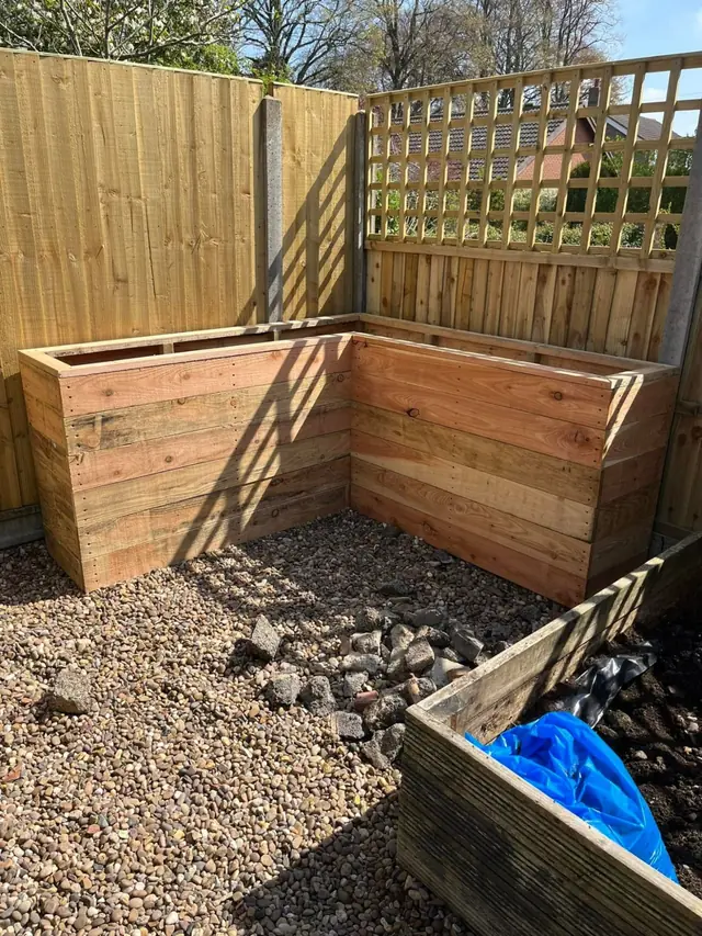 Raised planters with trellis
