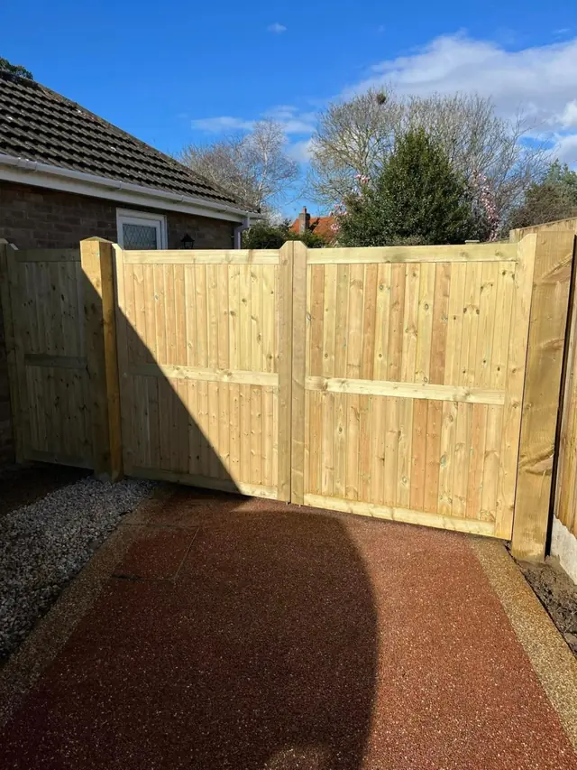 Tall closeboard driveway gate