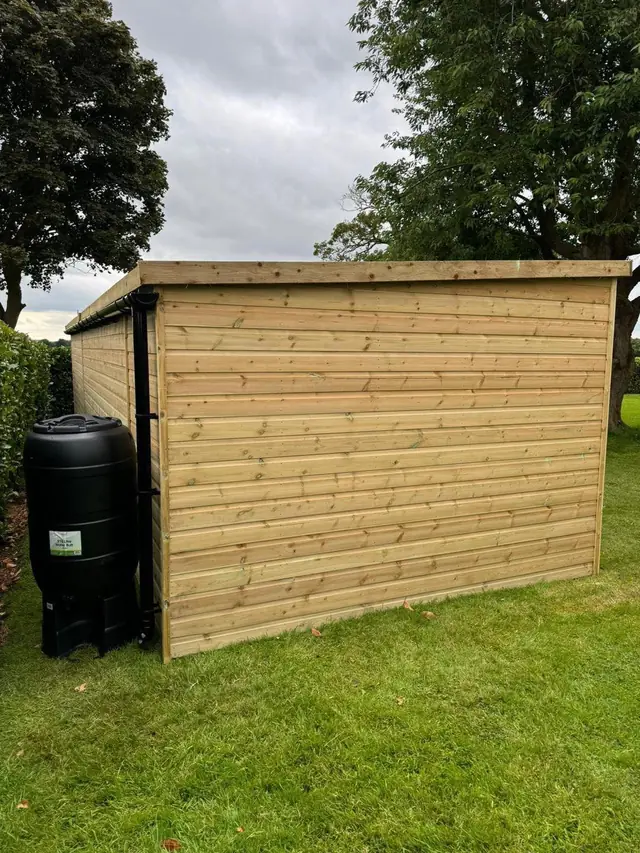 Pent shed beside a lawn