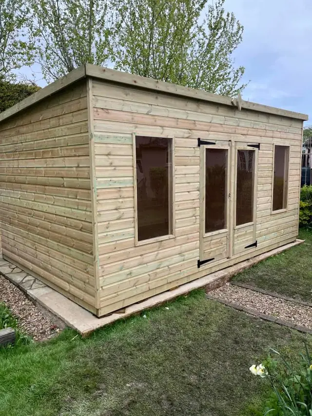 Pent garden room with windows