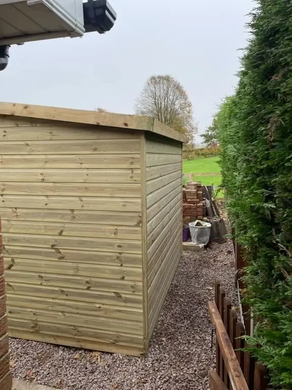 Tall pent shed