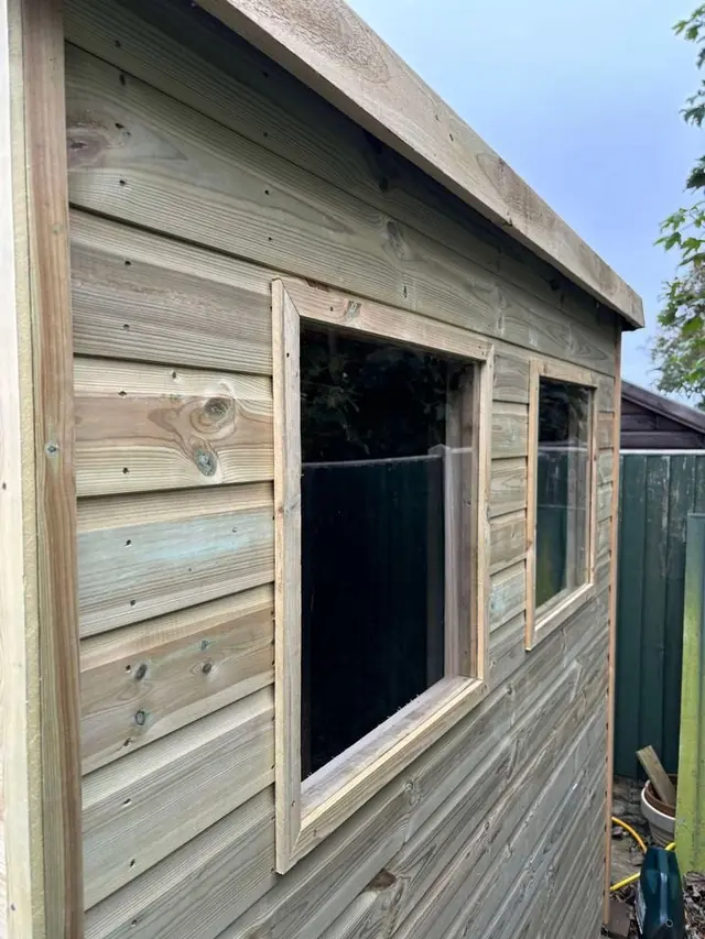 Shed with opening window