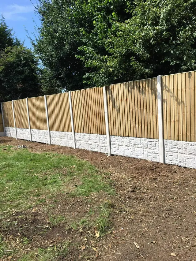 Fencing with concrete gravel boards