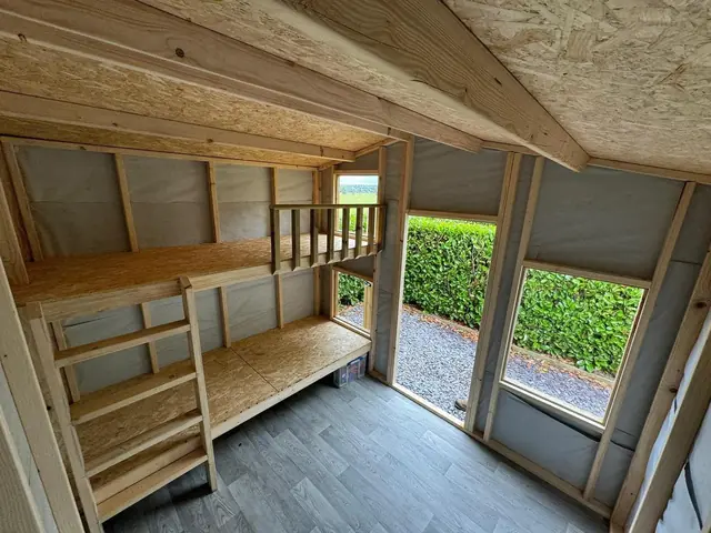 Workshop interior with built-in bench and shelving